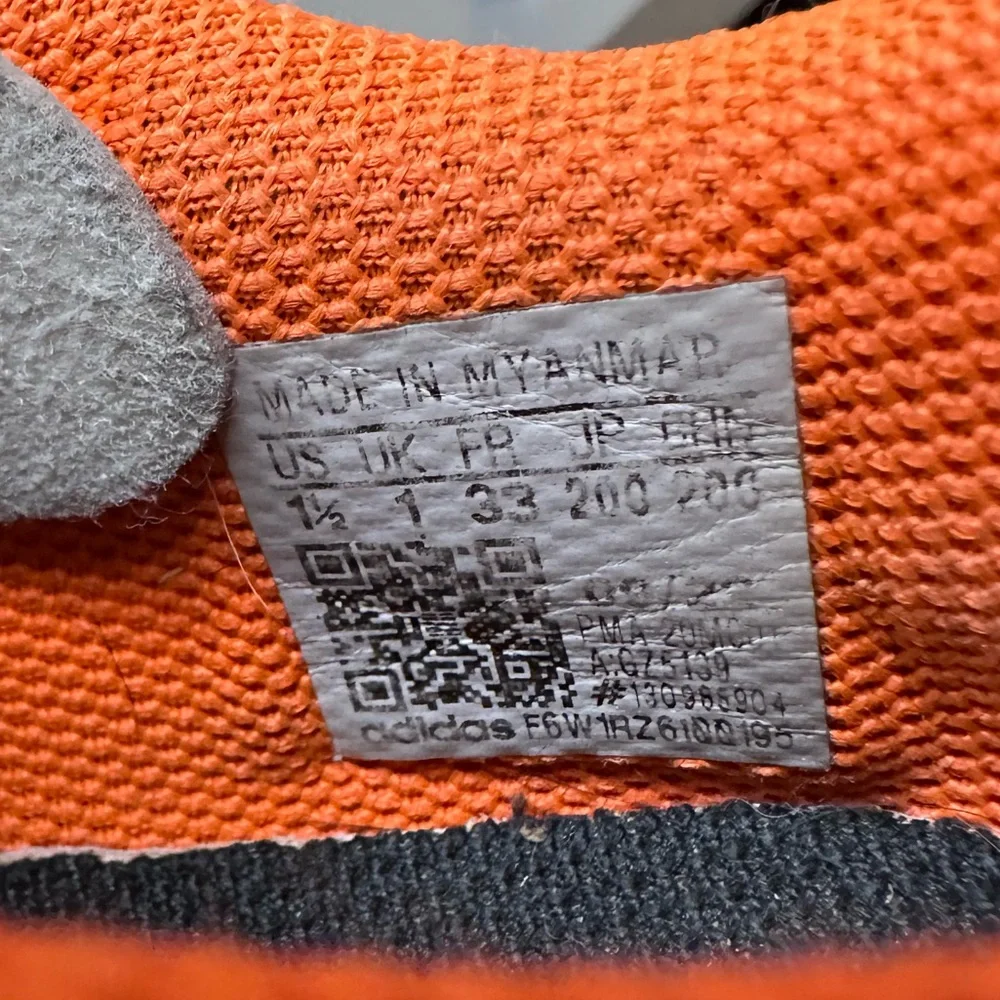 Kids' Orange and Black Soccer Cleats